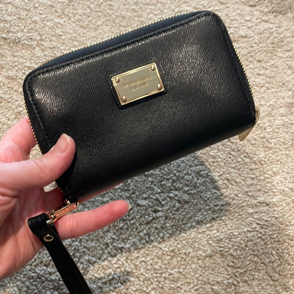 Micheal Kors Black wristlet.